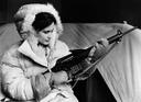 How can a  young lady protect you in case of a polar bear attack? 

The photos shows KLM flight attendant Joanna Van Duffelen, with a Fairchild Armalite AR–10 combat rifle, dressed in Arctic clothing. 
Photo 1959.

The work of flight attendants and stewards begins long before the departure of the aircraft and does not end immediately after landing. The main thing in this job is not food and drinks, but the safety of passengers in any critical situation.

In 1958, KLM launched transarctic flights from Amsterdam to Tokyo with refueling in Anchorage.
It was the era of motor aircraft at the dawn of mass passenger aviation. The company paid special attention to the risk of an emergency landing in the Arctic. Each plane carried a set of survival equipment.

As you can see, KLM Dutch Airlines flight attendant Joanna is ready for the rigors of life in the Arctic. Ms. Van Duffelen is wearing Arctic survival gear aboard every KLM plane flying the polar route from Amsterdam to Tokyo. The set consists of hundreds of items, including sleeping bags, snow goggles, axes, snow saws, knives, traps, fishing nets, and special rations. The rifle, designed and developed by the Armalite division of Fairchild Engine Corporation and Airplane Corporation, is part of KLM's standard survival equipment.

So how can a frail flight attendant survive in the Arctic and protect herself and passengers in the event of a polar bear attack?

The Arctic survival kit included: warm down jackets, shared sleeping bags for 4 people, snowshoes, glasses, a 2-burner burner with dishes, a shovel, an axe, a raft, cords, candles, knives, flares, flasks and much more. But the most important thing is the AR-10 carbines in case of a collision with a polar bear :)

In total, 4-engine DC-7 aircraft took 400 kg of equipment on each flight.