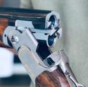 Beretta DT11 Gold Review: A Shotgun for the Discerning Clay and Game Shooter

The Beretta DT11 Gold stands as a testament to Beretta's unwavering commitment to quality, precision, and performance. This over-and-under shotgun, an evolution of the revered DT10, has earned its place among the elite firearms favored by competitive shooters and discerning hunters alike.  But does the DT11 Gold live up to the hype and justify its substantial price tag? This in-depth review explores its features, performance, and suitability for various hunting scenarios.

An Overview: What Makes the DT11 Gold Special?

The DT11 Gold isn't just a visually stunning shotgun; it's engineered for superior balance, reduced recoil, and exceptional durability. It's a gun that feels substantial in the hands, inspiring confidence with every swing.  Key features that set it apart include:

Wider Receiver: The DT11 boasts a wider receiver than its predecessor, adding weight between the hands, resulting in enhanced stability and smoother handling.

Steelium Pro Barrels: Beretta's Steelium Pro barrels are made with a proprietary tri-alloy steel and deep-drilling cold hammering, followed by vacuum stress relieving.  This process ensures exceptional bore concentricity and consistent patterns.

Adjustable Trigger: A crisp, adjustable trigger is crucial for precise shooting, and the DT11 Gold doesn't disappoint.

Hand-Finished Detailing:  The gold accents, meticulous engraving, and premium wood speak to Beretta's dedication to craftsmanship.

Variants and Modifications:

While the core DT11 Gold design remains consistent, several variations and modifications cater to specific needs:

DT11 Sporting:  The standard sporting model, ideal for clays and hunting upland game.

DT11 Trap: Designed for trap shooting, with a higher rib and optimized stock dimensions for consistent target acquisition.

DT11 Skeet: Similar to the sporting model but with barrel lengths and chokes tailored to skeet shooting.

Custom Options: DT11 platforms allow for near endless customization possibilities when ordered through Beretta.

Key Systems and Technologies:

Crossbolt Locking System: Beretta's robust crossbolt locking system provides exceptional strength and longevity, ensuring the gun remains tight and reliable through countless rounds.

Ejectors: Powerful and reliable ejectors ensure spent shells are cleared quickly and efficiently, essential for fast follow-up shots.

Steelium Pro Barrel Technology: This process optimizes the bore and choke geometry, resulting in consistent patterns and reduced recoil.

B-Fast Balancing System: Allows for easy adjustment of the shotgun's balance by adding or removing weights in the stock.

Calibers, Specifications, and Performance Data:

Calibers: Primarily available in 12 gauge.

Barrel Lengths: Typically offered in 28", 30", and 32" options.

Chokes: Comes with interchangeable chokes (usually Optima-Choke HP), allowing for customization based on the target and distance.

Weight: Varies depending on configuration, but typically ranges from 8 to 8.5 lbs.

Trigger Pull: Adjustable, typically factory set around 3.5 lbs.

Length of Pull: Standard is generally 14.75", but can be altered.

Typical Shot Distances (Hunting): Effective range varies based on game and choke selection. For upland birds, 25-40 yards is typical. For waterfowl, with appropriate steel shot and choke, ranges can extend to 50 yards.

Hunting Applications: What Can You Hunt With a DT11 Gold?

The DT11 Gold is versatile enough for a variety of hunting scenarios:

Upland Birds: Pheasant, quail, grouse, partridge – its balance and responsiveness make it well-suited for quick, instinctive shots.

Waterfowl: With proper choke and steel shot selection, it's capable of taking ducks and geese.  However, be mindful of the gold accents in marsh environments.

Sporting Clays: Its primary design function, where it excels.

Small Game: Rabbits and squirrels can be ethically pursued, but consider the potential for damage due to the gun's power and pattern density.

What Owners and Experts Are Saying (Pros and Cons):

Pros:

Exceptional Build Quality:  Second to none in terms of fit, finish, and overall craftsmanship.

Outstanding Balance and Handling:  Smooth, responsive, and a joy to shoot.

Low Recoil:  The wider receiver and Steelium Pro barrels effectively mitigate recoil, allowing for comfortable extended shooting sessions.

Consistent Patterns:  The Steelium Pro barrels deliver tight, even patterns, increasing the likelihood of clean kills.

Prestige and Aesthetics:  A beautiful gun that commands attention.

Cons:

High Price:  A significant investment, making it inaccessible to many shooters.

Weight: Can be tiring to carry for extended periods in the field, especially for smaller-framed hunters.

Maintenance: Requires careful cleaning and maintenance to preserve its finish and performance.

Gold Accents: The gold accents can reflect sunlight easily, and become a slight hindrance on animals like waterfowl

Conclusion:

The Beretta DT11 Gold is a truly exceptional shotgun. Its superior build quality, balance, and performance make it a standout choice for competitive shooters and discerning hunters who appreciate the finer things in life. While the price tag is substantial, the DT11 Gold represents a worthwhile investment for those who demand the very best. However, be realistic about your needs and consider whether its features and performance advantages justify the cost compared to other high-quality shotguns. If you crave uncompromising performance, stunning aesthetics, and a legacy of excellence, the DT11 Gold deserves your serious consideration. 

#beretta #dt11

https://m.uh.app/news/beretta-686-silver-pigeon-i-review-for-generations-the-beretta-686_RKz3YPYfEe-eLTdL3BmiLA
