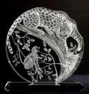7 inch circle I engraved front and back and also shaped along the edge with leopard and vervet monkey -all freehand engraved