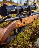 Sako 90 Grizzly Review: A Timeless Bolt-Action Rifle for Big Game Hunters, Caliber, Price. 🦌

The Sako 90 Grizzly is more than just a rifle — it’s a tribute to traditional craftsmanship fused with modern engineering. Designed for serious hunters and precision shooters, this bolt-action rifle from Finland’s legendary Sako brand delivers elegance, ruggedness, and performance in one refined package.

🧱 Design & Build Quality Sako 90 Grizzly

The Grizzly stands out with its Grade 2 walnut stock, featuring a sculpted cheekpiece and ergonomic pistol grip for optimal shooting posture. The fluted barrel not only reduces weight but enhances heat dissipation during extended shooting sessions. The rifle’s stainless steel action is coated in Tungsten Cerakote, offering superior corrosion resistance and a sleek matte finish.

• Stock: High-grade walnut with oil finish
• Barrel: Medium contour, fluted, cold hammer-forged
• Finish: Tungsten Cerakote on barrel and receiver
• Mounting: Integrated Picatinny rail for optics

⚙️ Action & Trigger System 

The Sako 90 Grizzly features a three-lug bolt with a 60° lift, ensuring fast and smooth cycling. The bolt is engineered for push-feed reliability, and includes dual plunger ejectors for consistent case ejection. The multi-stage adjustable trigger allows shooters to fine-tune pull weight between ~900g to 1800g without disassembly.

• Bolt: Three-lug, push-feed, twin ejectors
• Trigger: 5-stage adjustable, crisp break
• Safety: Two-position with bolt unlock button

🎯 Caliber Options & Ballistics Sako 90 Grizzly

The Grizzly is available in a wide range of calibers, making it suitable for everything from deer to moose and bear. Popular chamberings include:

• .308 Win – versatile, low recoil, ideal for deer and boar
• .30-06 Springfield – classic big game round with excellent terminal performance
• .300 Win Mag – long-range powerhouse for elk, moose, and bear
• 9.3x62mm – European favorite for driven hunts and large game

Effective range varies by caliber, but with proper optics and ammunition, the Grizzly can confidently reach 400–600 meters for ethical hunting shots.

💰 Price & Availability Sako 90 Grizzly

The Sako 90 Grizzly typically retails between $2,500–$2,800 USD, depending on configuration and region. While not budget-friendly, its build quality and performance justify the investment for serious hunters.

🦍 Hunting Applications

This rifle is purpose-built for big game hunting in diverse environments:

• Forest stalking: ergonomic stock and smooth bolt make it ideal for quick follow-up shots
• Mountain hunts: fluted barrel and balanced weight aid in maneuverability
• Stand hunting: traditional aesthetics and reliability suit long waits in harsh weather

⭐ Pros & Cons Sako 90 Grizzly

Pros:

• Exceptional accuracy out of the box
• Smooth bolt operation with reliable ejection
• Elegant walnut stock with modern durability
• Wide caliber selection for various game
• Adjustable trigger and optics-ready receiver

Cons:

• Premium price point
• Heavier than ultralight mountain rifles
• Limited aftermarket accessories compared to modular platforms

🗣️ User Feedback & Reputation

Hunters and competitive shooters consistently praise the Grizzly for its sub-MOA accuracy, flawless reliability, and classic aesthetics. It’s often compared favorably to the Sako 85 and older models, with many noting the improved bolt feel and trigger adjustability.

“The Grizzly feels like a rifle built for generations. It’s the kind of gun you pass down, not trade in.” — Field review, Petersen’s Hunting 

🏁 Why Choose the Sako 90 Grizzly?

If you value heritage, precision, and dependability, the Grizzly is a standout choice. It’s not just a tool — it’s a rifle that connects tradition with performance. Whether you’re stalking red deer in Europe or chasing elk in North America, the Grizzly delivers with confidence.

🧪 Field Performance & Accuracy

In real-world hunting scenarios, the Sako 90 Grizzly has proven itself with consistent sub-MOA accuracy using factory loads. A test rifle chambered in .300 Win Mag delivered five-shot groups averaging 1.05 inches at 100 yards, even before barrel break-in. This level of precision is attributed to Sako’s cold hammer-forged barrels and refined bedding system, which ensures repeatable accuracy shot after shot.

• Barrel twist rates optimized for lead-free ammunition • Crowned muzzle for uniform gas release • Factory-tested with high-pressure CIP rounds for safety

🔧 Engineering Evolution

The Grizzly is part of the broader Sako 90 family, which evolved from the Sako 85. Key mechanical upgrades include:

• Double plunger ejection system — borrowed from Sako’s TRG tactical rifles, ensuring robust case ejection even under stress • Bolt assist plunger — simplifies disassembly and enhances reliability • Broached receiver — improves bolt smoothness and alignment for tighter tolerances • Integrated Picatinny rail — replaces older proprietary mounts, allowing flexible optics setup

These refinements make the Grizzly not just a cosmetic upgrade, but a mechanical leap forward.

🧠 User Sentiment & Community Insights

Across forums and reviews, the Grizzly earns praise for its balance of tradition and innovation. Shooters highlight the tactile quality of the walnut stock, the intuitive trigger adjustment, and the rifle’s ability to handle both lead and non-lead ammunition with ease4.

Some longtime Sako fans note that while the Grizzly may not be as modular as newer tactical platforms, it excels in what matters most to hunters: reliability, accuracy, and timeless design.

💬 “The trigger is bloody top-notch. I’d rate it superior to both the 75 & 85 series.” — User review on Enough Gun forum

💬 “Sako didn’t reinvent the wheel — they refined it. The Grizzly is a rifle that feels like it belongs in the field and in the family.” — County Deer Stalking review

📦 Final Verdict

The Sako 90 Grizzly isn’t trying to be everything to everyone 👍🏻