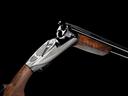 Гладкоствольное ружье Benelli 828 U Chrome 12/76, 71

Описание
828 – номер Урбино в списке объектов Всемирного наследия ЮНЕСКО, а буква «U» использовалась в качестве сокращённого названия герцогства Урбинского, которое в период правления незабвенного Федерико да Монтефельтро стало одним из трёх центров итальянского Возрождения. Таким образом, название «828U» объединяет в себе культурное наследие прошлого и технологические достижения наших дней.

Элегантность исполнения «Silver» подчёркивается стремительными очертаниями колодки, украшенной оригинальной гравировкой, которые гармонично сочетаются с линиями ложа.

Ружьё оснащено системой дифференцированного поглощения импульса отдачи «Progressive Comfort», состоящей из установленного в полости приклада амортизатора, сменных затыльников и гребней и комплекта проставок (5 для регулировки погиба от 45 до 65 мм с шагом 5 мм, 4 для регулировки отвода на ±6, ±3, ±6 ½, ±3 ½ ), позволяющих выбрать сорок вариантов положения приклада. Комплект сменных затыльников позволяет регулировать длину приклада в весьма широких пределах: от стандартных 375 мм до 385 мм, а при необходимости можно приобрести короткий приклад длиной 365 мм. Неотъемлемой частью системы полного комфорта являются сменные гребни из пенополиуретана, которые не только снижают ударную нагрузку на мягкие ткани лица, но и поглощают возникающую в момент выстрела вредную вибрацию, способную при длительном воздействии привести к повреждению органов внутреннего уха.

Механизм запирания представляет собой L-образный клиновой затвор с четырьмя точками скрепления. При закрытой колодке нижний выступ затвора надевается на выступающий фланец ствольной муфты, а его верхняя часть входит в зацепление с двумя массивными крюками, расположенными в верхней части последней.

Блок УСМ сделан съёмным для облегчения ухода и регулировки. Накол капсюля осуществляется при помощи лёгких подпружиненных бойков, по которым бьют прямолинейно движущиеся ударники. Взведение последних происходит при помощи затворного ключа. Такая конструкция обеспечивает максимальную компактность, надёжности и быстродействие спуска. Автоматическое переключения ствола происходит за счёт смещения инертной массы под воздействием импульса отдачи. Предусмотрен и ручной селектор, установленный на ползуне предохранителя.

Технологии:
POWERBORE. Криогенный ствол Power Bore со сверловкой от 18,3 до 18,4 мм способствует оптимальному преобразованию химической энергии пороха в кинетическую энергию снаряда, что значительно повышает его начальную скорость, улучшает кучность и резкость боя.

PROGRESSIVE COMFORT. Новейшее амортизирующее устройство с прогрессивным поглощением импульса отдачи, состоящее из затыльника и установленного в прикладе амортизатора. Обеспечивает эффективное поглощение энергии ударного воздействия и вибрации, а также успешно компенсирует опрокидывающий момент, начиная с самых лёгких навесок

PERFECT FITTING Комплект проставок (5 для регулировки погиба от 45 до 65 мм с шагом 5 мм, 4 для регулировки отвода на ±6, ±3, ±6 ½, ±3 ½ ) позволяет выбрать сорок вариантов положения приклада. В результате удалось преодолеть традиционную для переломных ружей невозможность регулировки погиба и отвода, обеспечив будущим владельцам «828U» возможность сделать своё ружьё идеально прикладистым, не прибегая к сложным и дорогостоящим переделкам ложа.

LOCK PLATE. Запирание посредством L-образного клинового затвора с четырьмя точками скрепления. При закрытой колодке нижний выступ затвора надевается на выступающий фланец ствольной муфты, а его верхняя часть входит в зацепление с двумя массивными крюками, расположенными в верхней части последней. Таким образом, всё давление пороховых газов принимает на себя затвор, а на колодку действует только сила отдачи ствольного блока. В результате существенно повышается надёжность узла запирания и его ресурс, а поскольку осевые цапфы колодки практически не нагружены, сводится к минимуму вероятность разбалтывания шарнира.