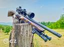 CZ 457 Thumbhole Varmint: характеристики, калибры, цена, отзывы, вопросы.

Карабин CZ 457 Thumbhole Varmint — это образец чешского оружейного мастерства, сочетающий в себе точность, эргономику и универсальность. Он создан для охотников, фермеров и стрелков, которым важно надежное и удобное оружие для отстрела вредителей, тренировок и соревнований.

🧩 Общая информация и назначение CZ 457

CZ 457 Thumbhole Varmint — это модификация популярной серии CZ 457, пришедшей на смену CZ 455. Модель отличается ортопедическим ложем из ламината с отверстием для большого пальца, что обеспечивает комфортную вкладку и стабильность при стрельбе. Это оружие идеально подходит для:

• Охоты на мелкую дичь: сурки, белки, зайцы, лисы, тетерева
• Отстрела вредителей на ферме
• Спортивной и развлекательной стрельбы на средние дистанции

🔧 Конструкция и особенности CZ 457

• Тип действия: продольно-скользящий болтовой затвор с углом поворота 60°
• Материал ствольной коробки: цельнофрезерованная сталь с нитридным покрытием
• Ложа: многослойный ламинат, симметричная, подходит для правшей и левшей
• Спусковой механизм: регулируемый, усилие от 0,815 до 1,53 кг
• Магазин: отъемный, на 5 патронов, утоплен в ложе
• Резьба на стволе: 1/2x20 UNF для установки дульных устройств
• Крепление оптики: планка «ласточкин хвост» 11 мм

🎯 Калибры и дальность стрельбы CZ 457

Модель Thumbhole Varmint доступна в трех калибрах:

• .22 LR — классика для охоты на мелкую дичь и тренировок (дальность эффективной стрельбы: 20–70 м)
• .22 WMR — повышенная мощность, подходит для более крупной цели (до 100 м)
• .17 HMR — высокая точность и скорость, идеален для варминта (до 120 м)

📏 Характеристики CZ 457

• Длина ствола: 412,5 мм или 525 мм (в зависимости от модификации)
• Общая длина: ~981 мм
• Вес: 3,2–3,5 кг
• Материал ствола: оружейная сталь, холодная ковка
• Точность: до 1 МОА при использовании качественных патронов

💰 Цена и доступность CZ 457

Средняя стоимость CZ 457 Thumbhole Varmint в России — от 160 000 до 185 000 рублей, в зависимости от комплектации и региона. В Европе цена варьируется от 490 до 730 евро.

🦊 Охота и применение CZ 457

С этим карабином охотятся на:

• Белок, сурков, сусликов
• Лисиц, зайцев
• Тетерева, глухаря

Благодаря низкой отдаче и высокой точности, винтовка подходит как для опытных охотников, так и для новичков.

👍 Отзывы и плюсы CZ 457

Преимущества:

• Отличная кучность
• Удобная ложа с ортопедическим дизайном
• Надежная конструкция и качественная сборка
• Универсальность: охота, спорт, фермерские задачи
• Совместимость с магазинами и стволами CZ 455

Недостатки:

• Отсутствие штатных прицельных приспособлений
• Высокая цена по сравнению с аналогами
• Ограниченная доступность в розничной продаже

🧠 Почему выбирают CZ 457 Thumbhole Varmint?

• Эргономика: ложа обеспечивает стабильную вкладку и комфорт при длительной стрельбе
• Модульность: возможность смены стволов и калибров
• Надежность: проверенная временем платформа CZ
• Точность: идеальна для варминта и спортивной стрельбы

🛠️ Модульность и совместимость

Одним из ключевых преимуществ CZ 457 Thumbhole Varmint является модульная конструкция, позволяющая владельцу адаптировать винтовку под свои нужды. Ствол крепится к ствольной коробке двумя винтами, что упрощает его замену. Это значит, что можно легко сменить калибр или длину ствола, не прибегая к услугам оружейника. Кроме того, сохраняется обратная совместимость с магазинами и стволами от предыдущей модели CZ 455, что делает апгрейд более доступным и экономичным.

🌦️ Надёжность в любых условиях

CZ 457 Thumbhole Varmint отлично справляется с работой в сложных погодных условиях. Благодаря нитридному покрытию металлических частей, винтовка устойчива к влаге, пыли и коррозии. Ложа из многослойного ламината не деформируется при перепадах температуры и влажности, а также сохраняет эстетичный вид даже после интенсивного использования. Это делает модель особенно привлекательной для охотников, которые часто работают в полевых условиях.

❓ Часто задаваемые вопросы CZ 457

1. Какие калибры доступны для CZ 457 Thumbhole Varmint?
Доступны три варианта:

• .22 LR — классика для охоты и тренировок
• .22 WMR — повышенная мощность
• .17 HMR — высокая точность и скорость

2. Можно ли менять калибр?
Да, CZ 457 имеет модульную систему: можно заменить ствол и использовать другой калибр. Совместимы со стволами от CZ 455.

3. Какой тип затвора используется?
Продольно-скользящий болтовой затвор с углом поворота 60°, что обеспечивает быструю перезарядку и совместимость с низкими кольцами оптики.

4. Есть ли резьба на стволе CZ 457?
Да, резьба 1/2x20 UNF позволяет установить дульные устройства — глушители, компенсаторы и др.

5. Какой магазин у винтовки?
Отъемный, на 5 патронов. Также доступны магазины на 10 патронов. Все магазины взаимозаменяемы.

6. Подходит ли винтовка для левшей?
Да, ложа симметричная, с отверстием для большого пальца, удобно как для правшей, так и для левшей.

7. Как регулируется спуск?
Усилие регулируется от 0,815 до 1,53 кг. Также можно настроить ход спускового крючка.

8. Есть ли штатные прицельные приспособления?
Нет, модель Thumbhole не оснащена мушкой и целиком. Предусмотрена установка оптики на планку «ласточкин хвост» 11 мм.

9. Какова точность стрельбы?
Производитель заявляет точность до 1 МОА или лучше при использовании качественных патронов.