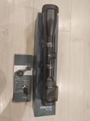 Overview of the Swarovski Z6i 2-12x50 L BR-I Scope with Illuminated Reticle

The Swarovski Z6i 2-12x50 L BR-I scope is a remarkable optical device that embodies the pinnacle of precision and performance in the world of hunting and shooting. Known for its innovative design and functionality, this scope stands out as an excellent choice for both experienced marksmen and avid hunters.

Key Features

Magnification and Objective Lens:

The Z6i offers a magnification range of 2-12x, making it incredibly versatile for various shooting scenarios. Whether you are engaging targets at close range or at a distance, this scope provides crystal-clear images. The large 50mm objective lens ensures brightness and clarity, even in low-light conditions, providing excellent performance during dawn and dusk—the prime times for hunting.

Illuminated Reticle:

One of the standout features of the Z6i is its illuminated reticle, which enhances visibility in challenging lighting environments. The BR-I reticle design offers precise aiming points, and the illumination can be easily adjusted to suit the lighting conditions, ensuring that the shooter can maintain focus on the target. This feature is especially beneficial for hunting in thick forests or during low-light situations.

Optical Quality:
Swarovski is renowned for its optical excellence, and the Z6i is no exception. The scope employs high-quality glass with anti-reflective coatings, resulting in exceptional light transmission and contrast. Users can expect a sharp, vivid image that allows for easy identification of targets even in challenging environments.

Robust Build and Ergonomics:

The Z6i is constructed with durability in mind; it is both waterproof and fog-proof, thanks to its nitrogen-filled body and sealed construction. This ruggedness ensures that the scope can withstand the rigors of outdoor use, from extreme temperatures to harsh weather. Additionally, the ergonomic design of the turret and adjustment settings allows for quick and intuitive operation in the field.

Adjustment Mechanism:

With a 1/4 MOA click value, the Z6i allows for precise adjustments to windage and elevation. The turret system is user-friendly, enabling quick zeroing and adjustments on-the-fly. This is crucial for changing conditions commonly encountered in hunting scenarios.

Weight and Size Considerations:

Weighing in at around 18 ounces and featuring a relatively compact design, the Z6i strikes a good balance between size and weight. It is easily mountable on various rifle types without significantly altering the rifle's balance, which is an important consideration for hunters who traverse diverse terrains.

In summary, the  Swarovski Z6i 2-12x50 L BR-I scope with illuminated reticle is a top-tier optical solution for hunters and shooters seeking unparalleled clarity and reliability. With its innovative features, superior optical quality, and rugged design, it represents an excellent investment for those serious experience #Z6i