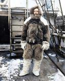 American Arctic explorer Robert E. Peary in polar expedition gear aboard his ship SS Roosevelt, 1908.

In the frigid expanse of the Arctic Ocean, where ice stretched endlessly and the sun barely peeked above the horizon, stood one of America’s most daring explorers, Robert Edwin Peary. It was the year 1908, a time when the world's eyes were fixed on the North Pole, an elusive goal that had captivated the imagination of adventurers for centuries. Peary, aboard his sturdy ship, the SS Roosevelt, prepared for what would be his final and most ambitious expedition to reach the top of the world.

The SS Roosevelt, named after the then-President Theodore Roosevelt who had supported Peary’s endeavors, was a specially designed vessel built to withstand the crushing grip of pack ice. 

Its reinforced hull, thick timbers, and powerful engine made it one of the few ships capable of navigating the treacherous waters of the Arctic. But even with such a formidable vessel, the journey ahead was fraught with danger—icebergs, blizzards, and the ever-present threat of frostbite and starvation.

Peary himself was a man of iron will and unyielding determination. Standing on the deck of the SS Roosevelt, bundled in layers of polar expedition gear, he cut an imposing figure. His face, weathered by years of exposure to the harsh elements, bore the marks of countlessexpeditions. 

His eyes, sharp and focused, scanned the horizon, searching for any sign of open water or shifting ice floes. He wore a heavy fur parka, its hood lined with wolf fur, which protected him from the biting cold. Thick mittens, crafted from seal skin, kept his hands warm, while his feet were encased in sealskin boots, insulated against the freezing temperatures.

Peary’s polar expedition gear was not merely about comfort; it was essential for survival. Every item he wore had been carefully chosen and tested over years of experience in the Arctic. His goggles, tinted to protect against snow blindness, rested snugly on his brow, ready to be slipped into place at a moment’s notice. Beneath his parka, he wore multiple layers of woolen clothing, each layer trapping precious body heat. Around his waist, a belt held various tools and instruments—compass, sextant, and a chronometer, all vital for navigation in a land where landmarks were scarce and the sky often obscured by clouds.

As the SS Roosevelt pushed through the icy waters, Peary’s mind was consumed with thoughts of the journey ahead. This was not his first attempt to reach the North Pole; previous expeditions had come agonizingly close, only to be thwarted by the unforgiving Arctic conditions. But this time, Peary felt different. This time, he believed he had the right combination of men, equipment, and luck to finally achieve his lifelong dream.