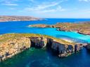 Comino Island, Malta

Accessible by ferry only from mainland Ċirkewwa, Comino is Malta’s least inhabited island. With only three residents reported since 2017, this small island boasts some of the clearest waters known to man. Popular for its blue lagoons, this is one island you have to visit.