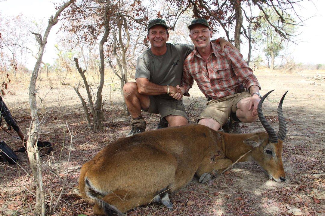 Hunting in Cascades: Waterfalls and wooded savannahs, Lobi traditions, forest wildlife, community vigilance, and conservation-linked hunting